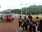SB Farrington and Kahuku hand shake