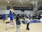 Jamal Coombs-McDaniel shoots in the extra finals