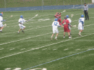 Dulaney_s_Jay_Mann_winds_up_to_shoot.JPG